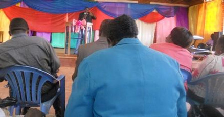 Pastor Isaac Peter Oyako preaching in Jinja Pentecostal Church - June 30th