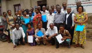students with certificates closing a successful teaching trip